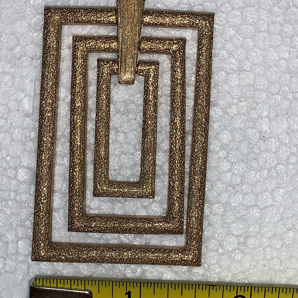 True vintage modern art gold plate pendant